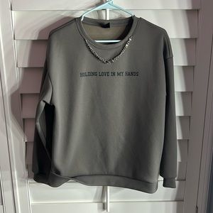 Gray sweatshirt with chain